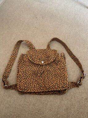 Baggu Leopard Print Canvas Mini Backpack Flap Drawstring Shoulder Bag Nutmeg Leopard Drawstring Backpack by Baggu – Thread + Seed main image 2